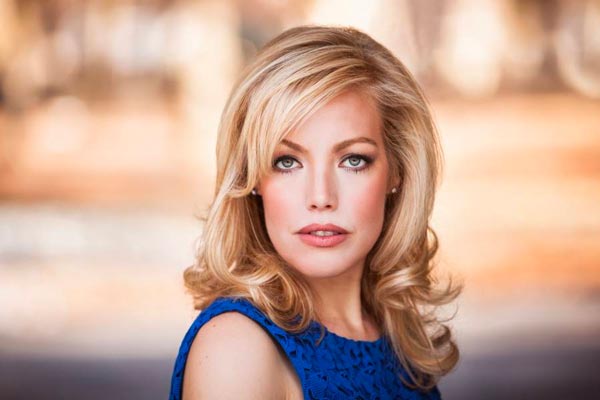 head shot of Jessica Sandidge, a blonde woman in blue sleeveless dress