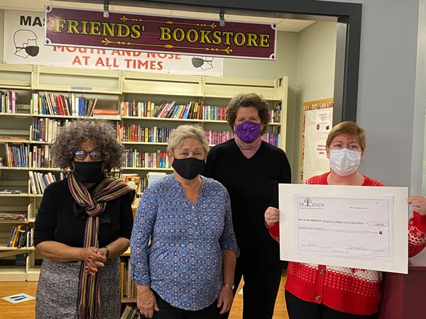 The Friends of the Margaret E. Heggan Free Public Library Present $7100 Check to Library